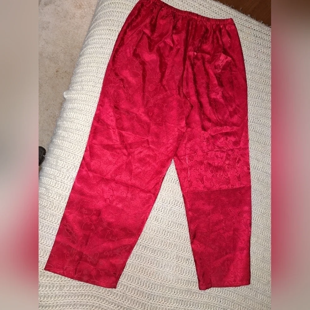 A Set of Enchanted Red Silky ladies pajamas in a large (14-16). EUC.